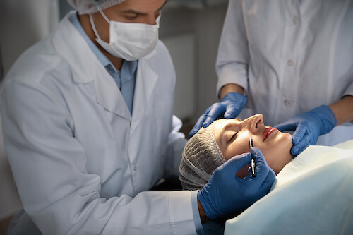bigstock Doctor And Nurse Preparing Fem 361238131